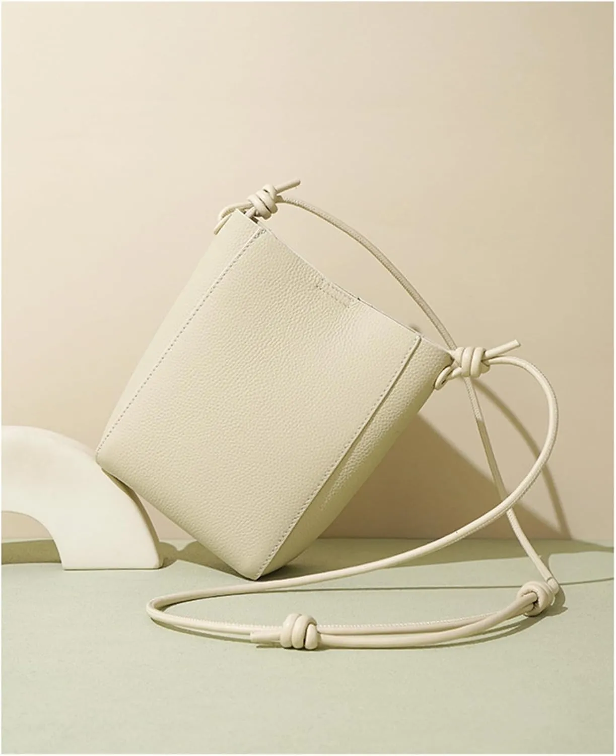 Head layer cowhide bag for women,lightweight and simple tote,bucket crossbody bag, adjustable drawstring shoulder Bag.