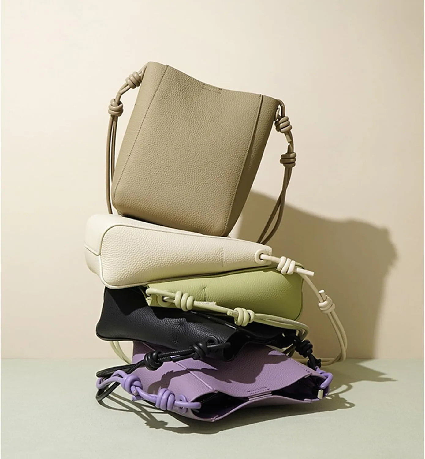 Head layer cowhide bag for women,lightweight and simple tote,bucket crossbody bag, adjustable drawstring shoulder Bag.